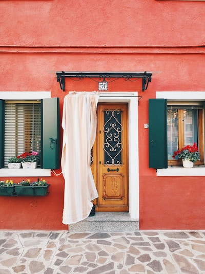 Picture of the front door to an old Italian house